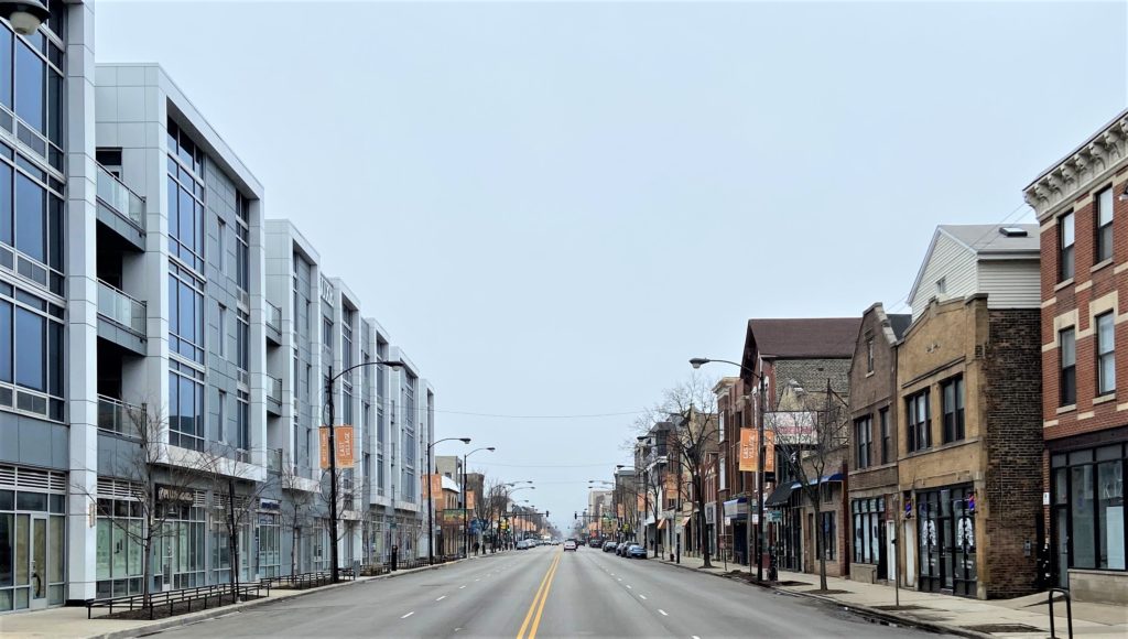 view down chicago avenue of new vs old construction