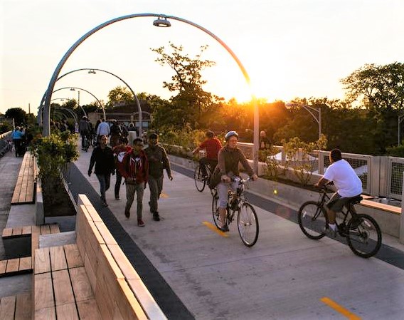 sunset on people using The 606 trail