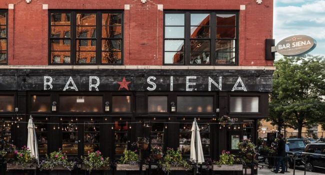 exterior view of buidling and sidewalk dining at Bar Siena